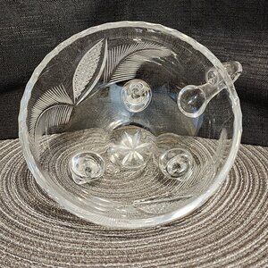 Tri-footed bowl with handle